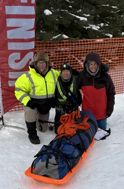Your podcast host Dale at the Arrowhead 135 finish line with his two sisters
