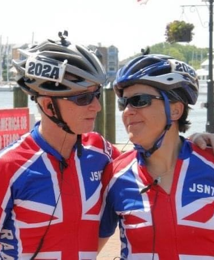 Brian and Stacey in their British flag jerseys finishing RAAM.