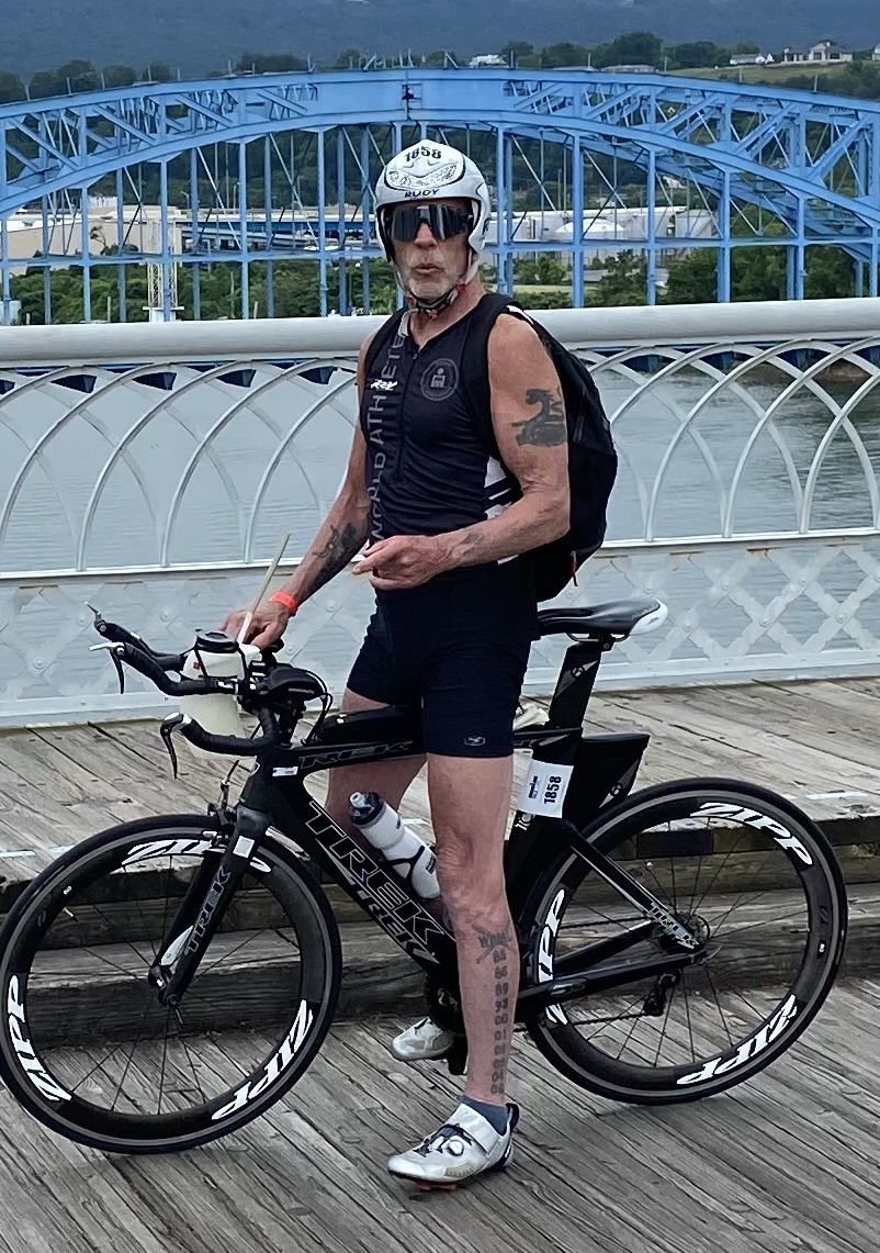 Ironman Bill atop his triathlon bike