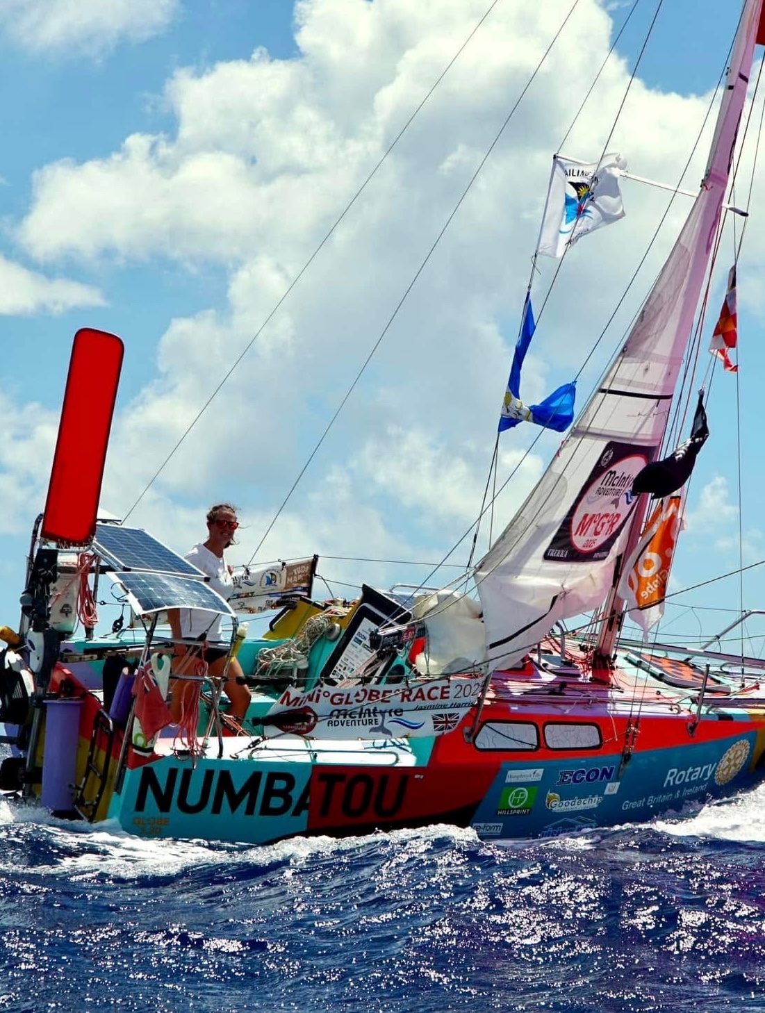 Jasmine at sail in her colorful boat