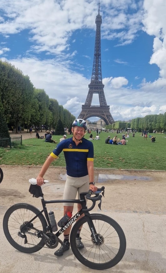 Rob with his bike by the Eiffel Tower