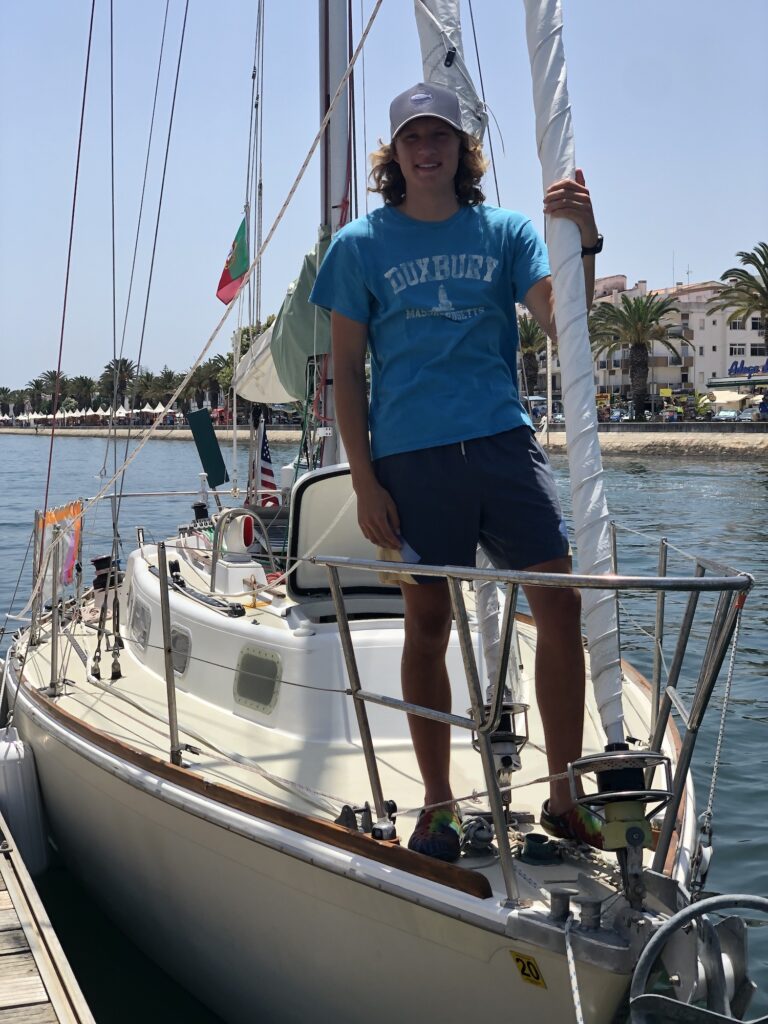 Cal aboard his sailboat