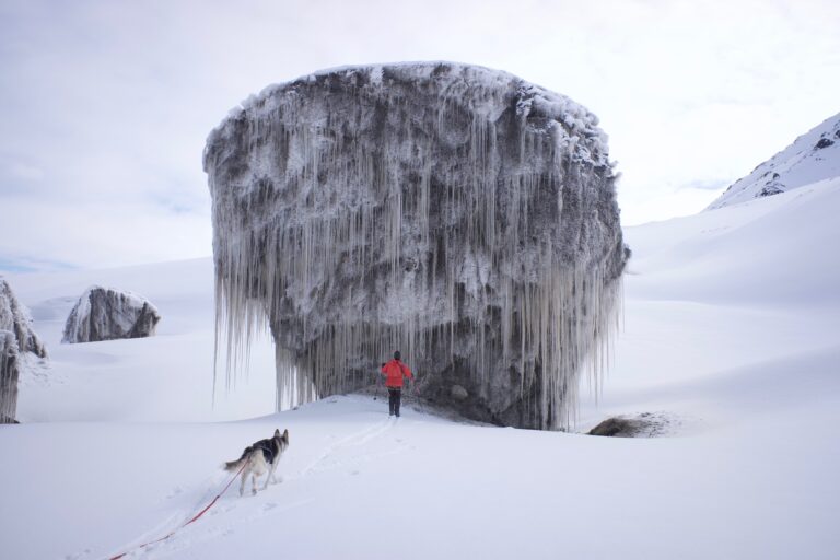 Giant rock covered in hundreds of massive icicles.