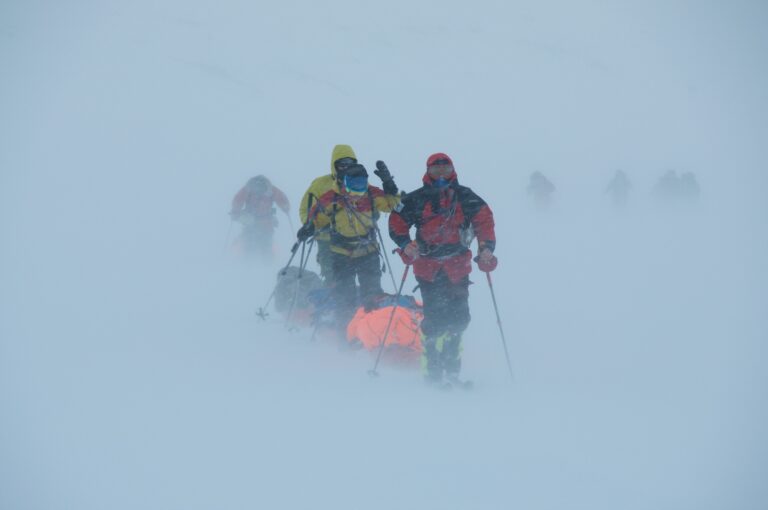 ski expedition in blizzard conditions