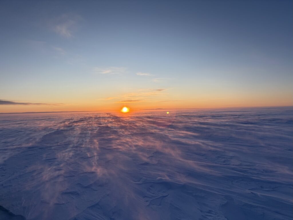 A gorgeous sunset on the windswept Greenland landscape