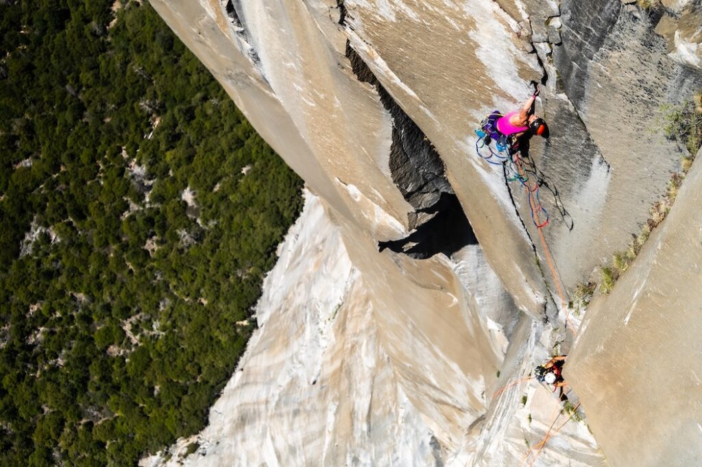Birdseye view of both climbers on the wall face high above the Yosemite Valley
