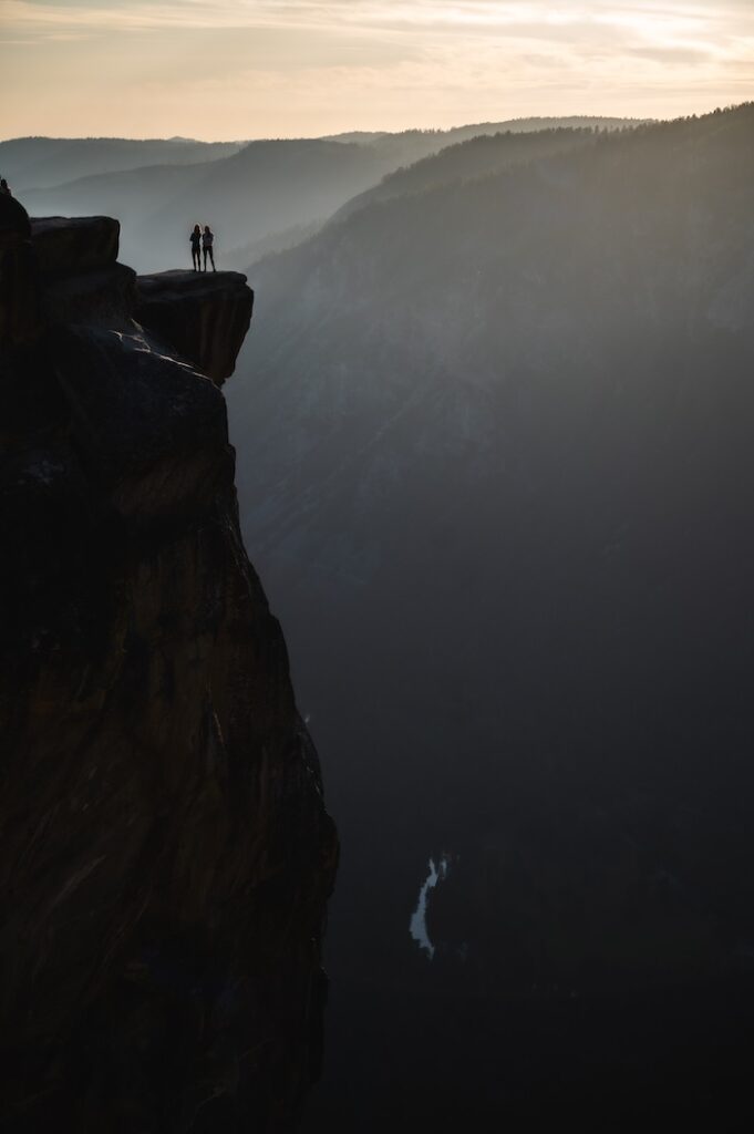 The 2 Yosemite Triple Crown climbers atop a spectacular lookout above Yosemite
