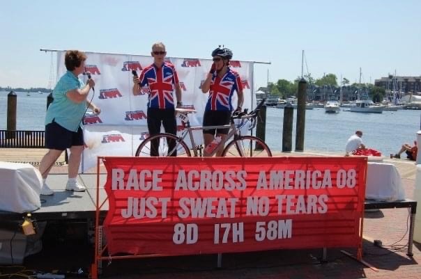 RAAM's British couple's team of Brian and Stacey on the finish podium
