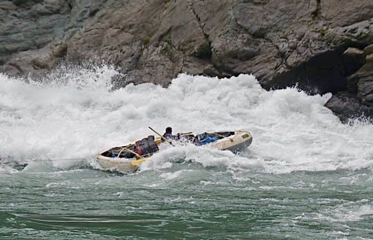 Raft in big rapids
