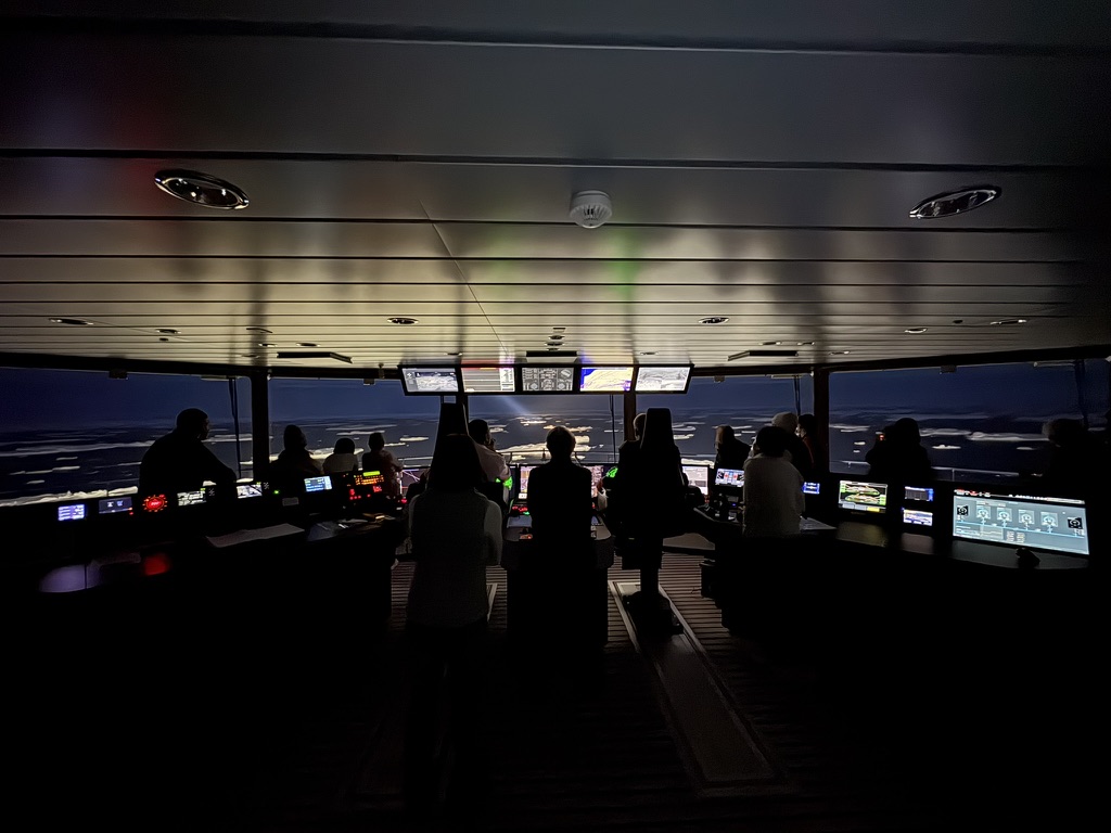 The bridge of the ship Resolution while navigating through ice at night
