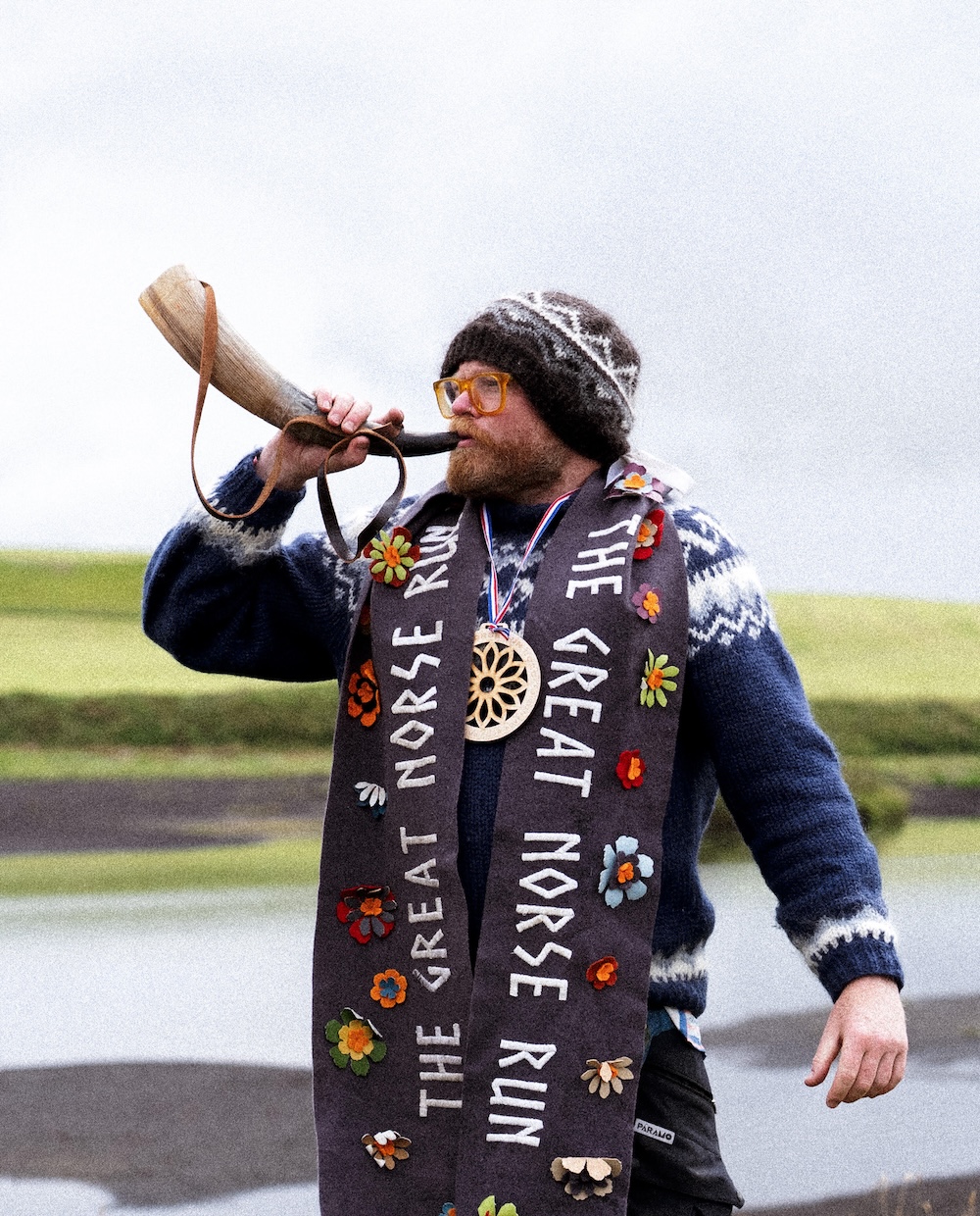 Danny the Chief Vibe Maker blowing his Icelandic horn