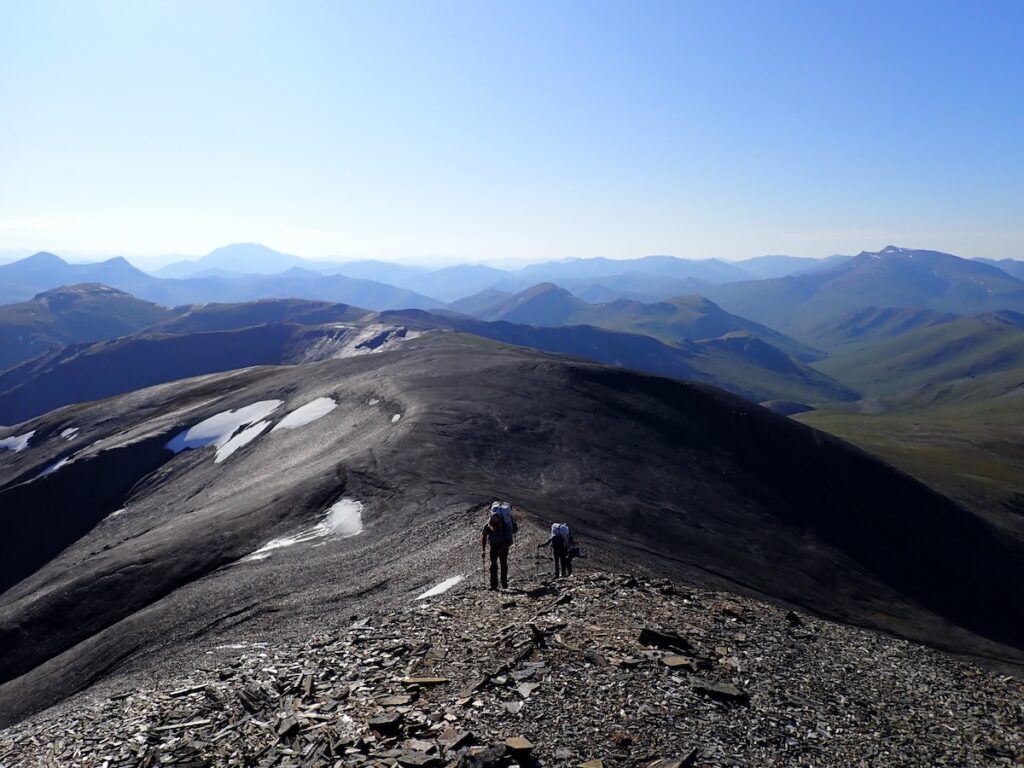Hiking a scree-filled ridgeline