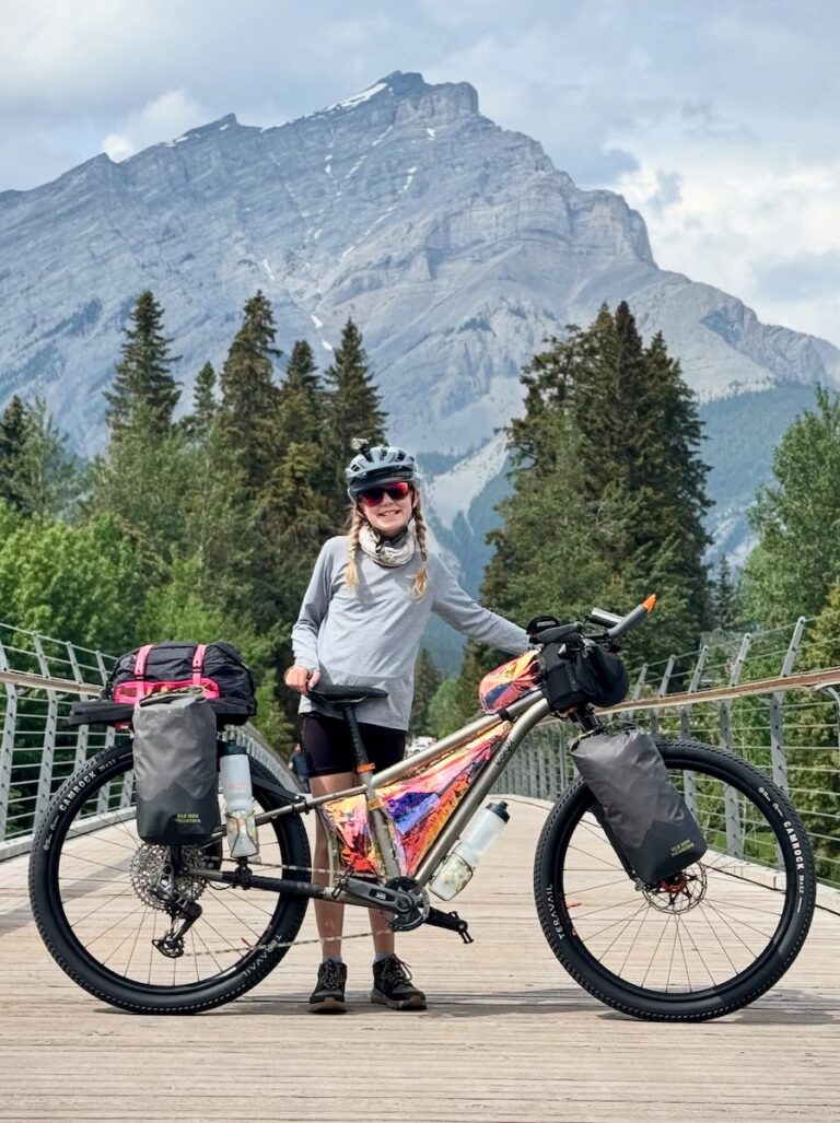 Molly and her mountain bike along the Great Divide Mount Bike Route