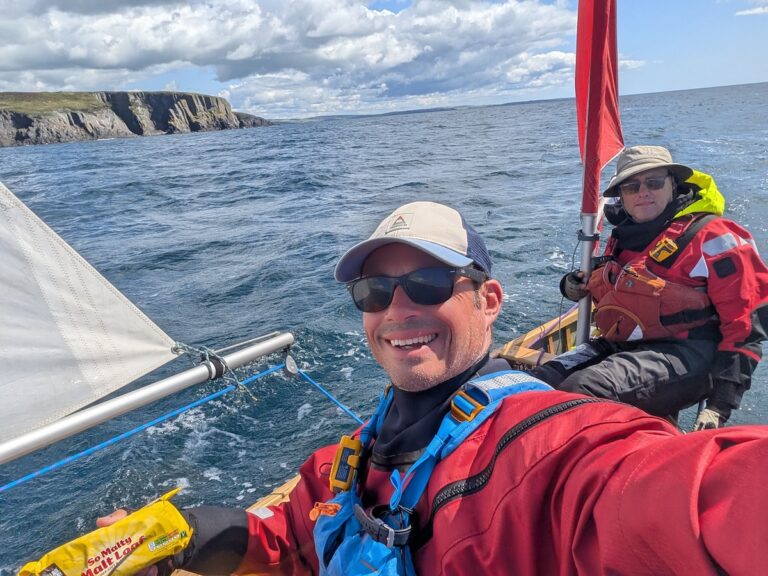 Rich at sea with the cliffs of Ireland in the background