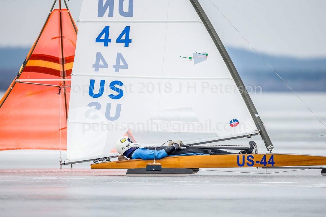 Flat on the back, racing an ice boat