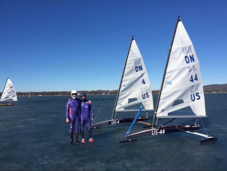 A pair of ice boaters by their rides