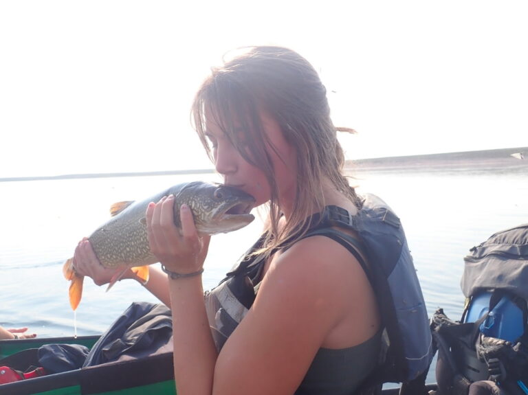 Kissing a fish - yummy!