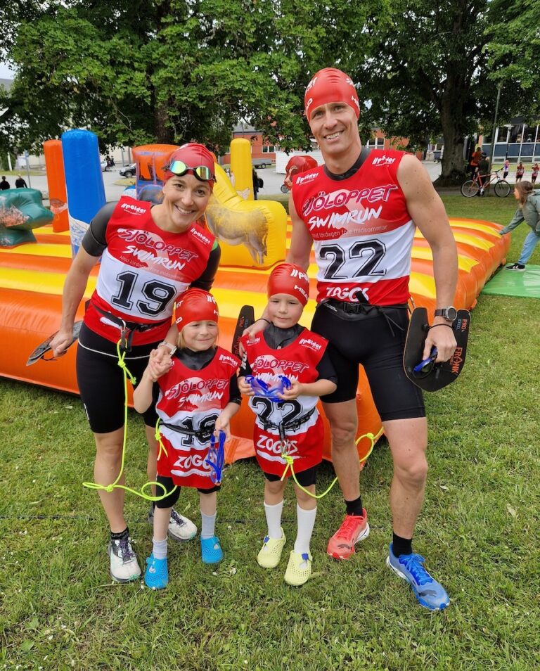 Johan and Hanna with 2 of their little kids ready for swim/run competition.