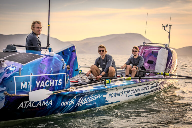 All 3 Maclean brothers at sea on their rowboat